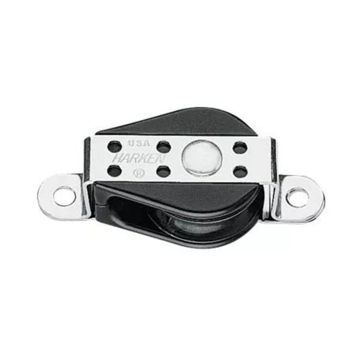 A Harken pulley block with a black rubberized surface and polished silver metal hardware, featuring the Harken brand name and 'USA' engraved on the metal plate.